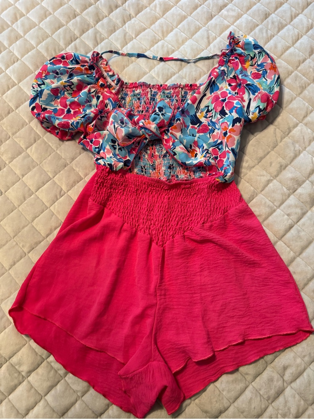 Floral Puff-Sleeve Smocked Romper in Bright Pink